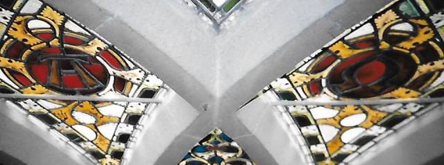 Alpha and Omega, detail from the east window in Holy Trinity Church, Huddersfield.