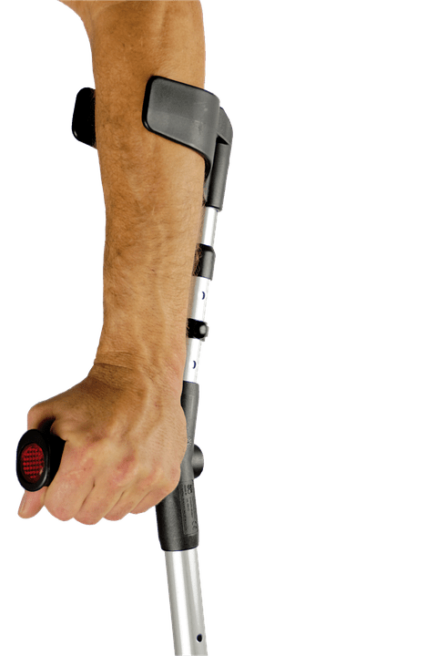 A man's left arm in an elbow crutch.