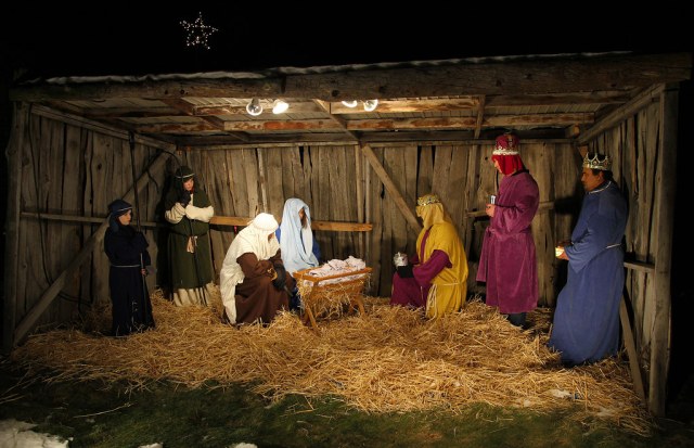 A typical Christmas manger scene featuring shepherds and magi.