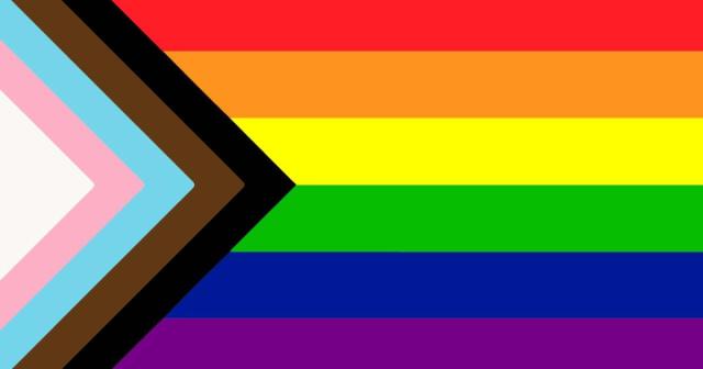 The new gay pride flag featurpng black and brown stripes to represent people of colour, and baby blue, pink and white to include the trans flag in its design.