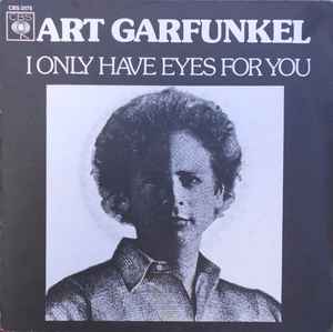 A record sleve for the vinyl single I only have eyes for you by Art Garfunkel on CBS records. The sleve contains the artist name and song title and a half lit photograph of Art Garfunkel.